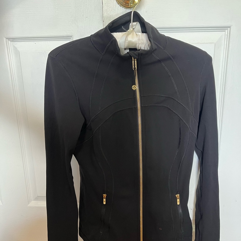 Black and gold Lululemon define
